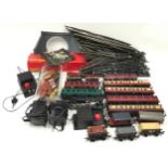 Collection of Hornby 00 Gauge track, carriages, controllers and accessories.