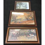 A collection of framed pictures.