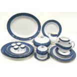Wedgwood blue and white part dinner service in the "Lynn" pattern to include serving platters.