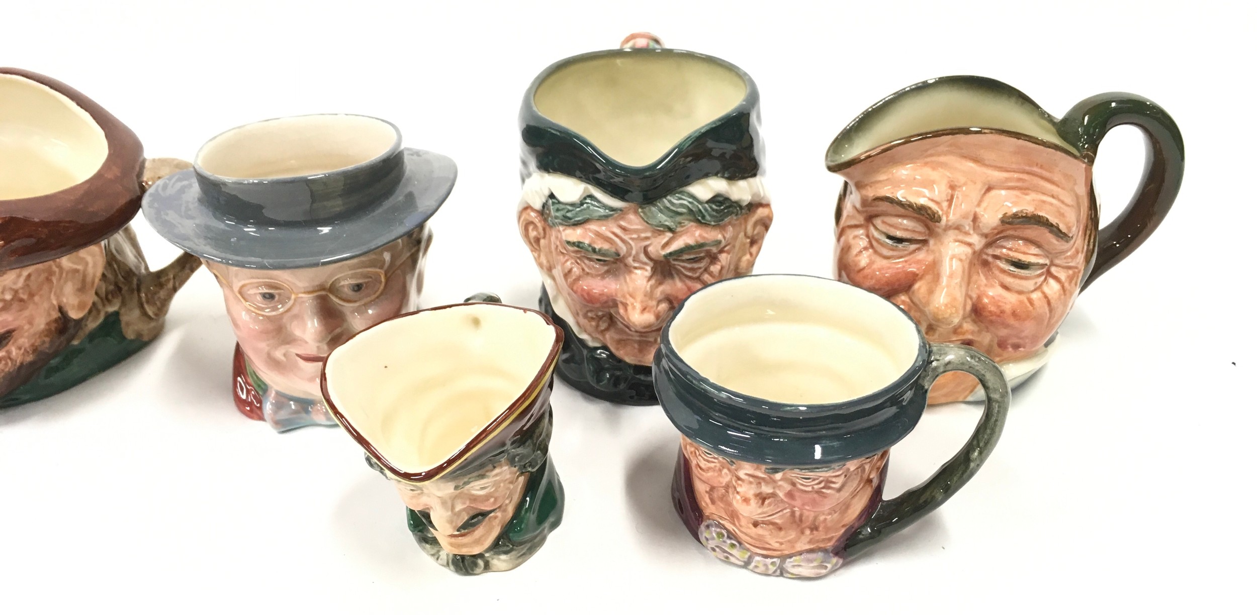 Eleven toby character jugs with examples by Royal Doulton and Beswick. - Image 2 of 5
