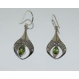 Ornate peridot 925 silver drop earrings.