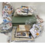 Very large box of loose world stamps. Part sorted into bags and folders