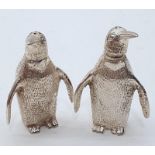 Silver plated condiments in the form of Penguins