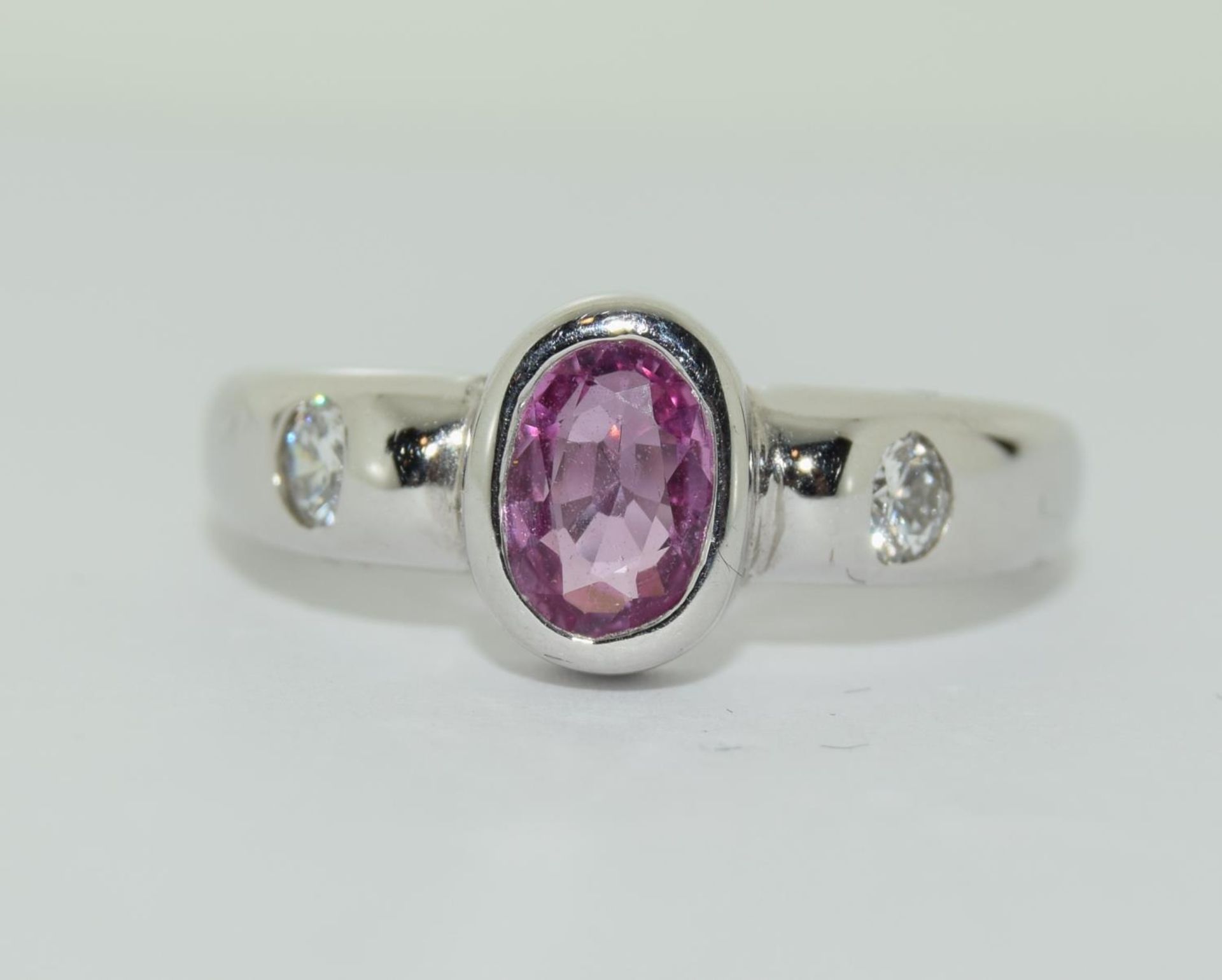 A 18ct white gold diamond and pink sapphire ring, approx weight, 6.4g diamond cut: brilliant and