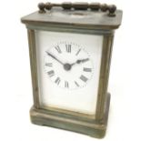 Antique brass carriage clock in good working order with key. 4.5" tall