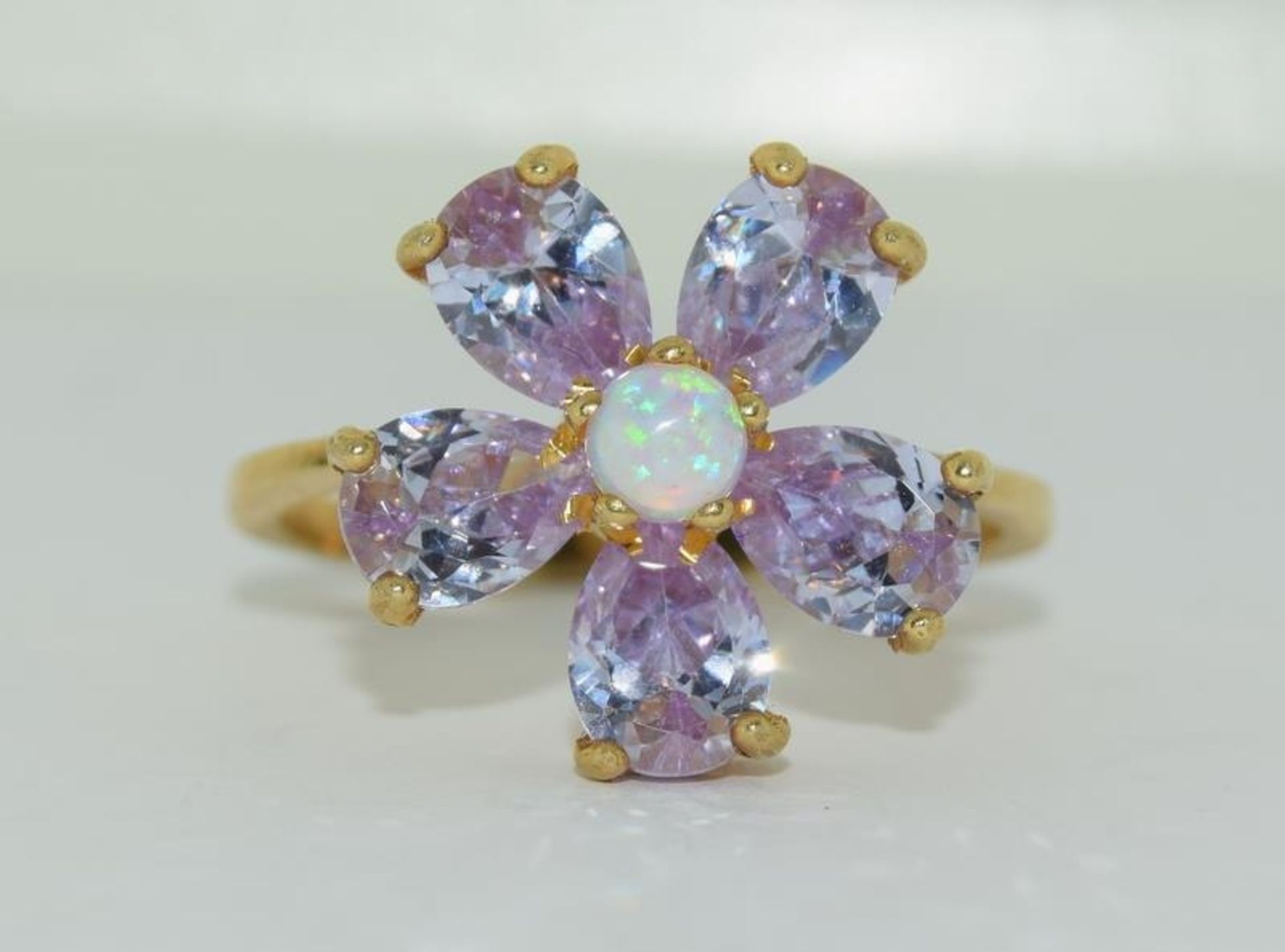 Gold on silver opaline CZ flower ring.