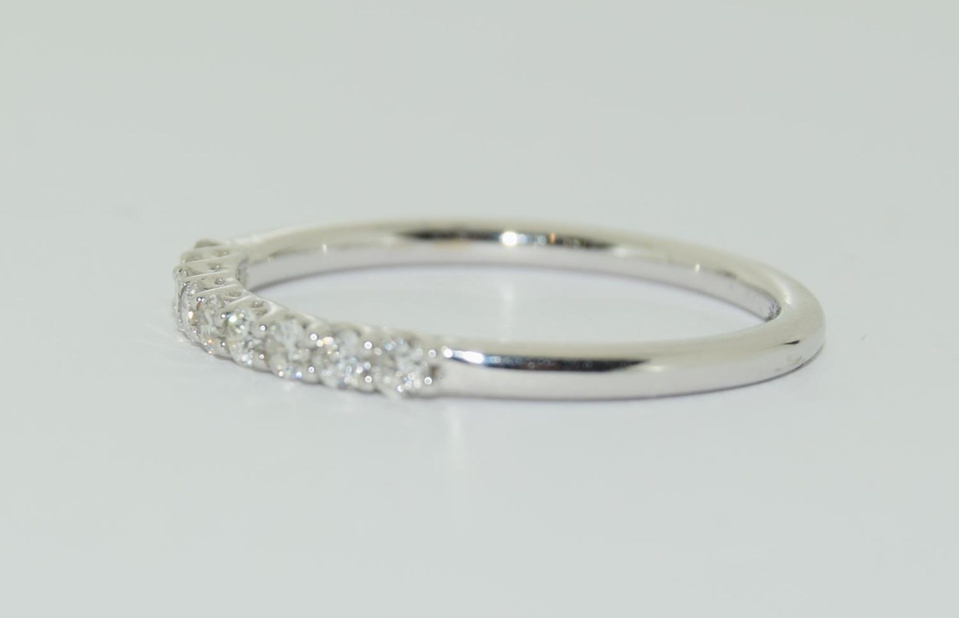 18ct white gold aura half eternity ring featuring nine uniform brilliant round cut diamonds each - Image 4 of 5