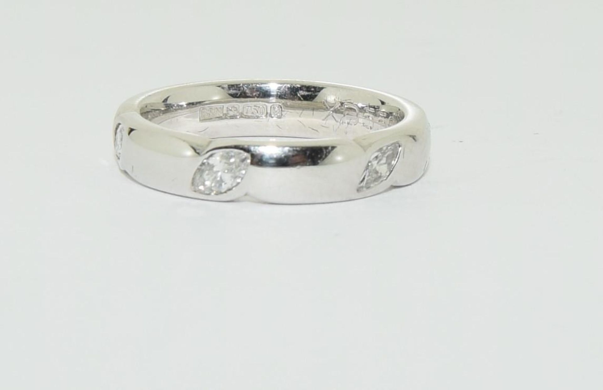 18ct white gold diamond set wedding band with Marquise cut diamond 6.1gm size M