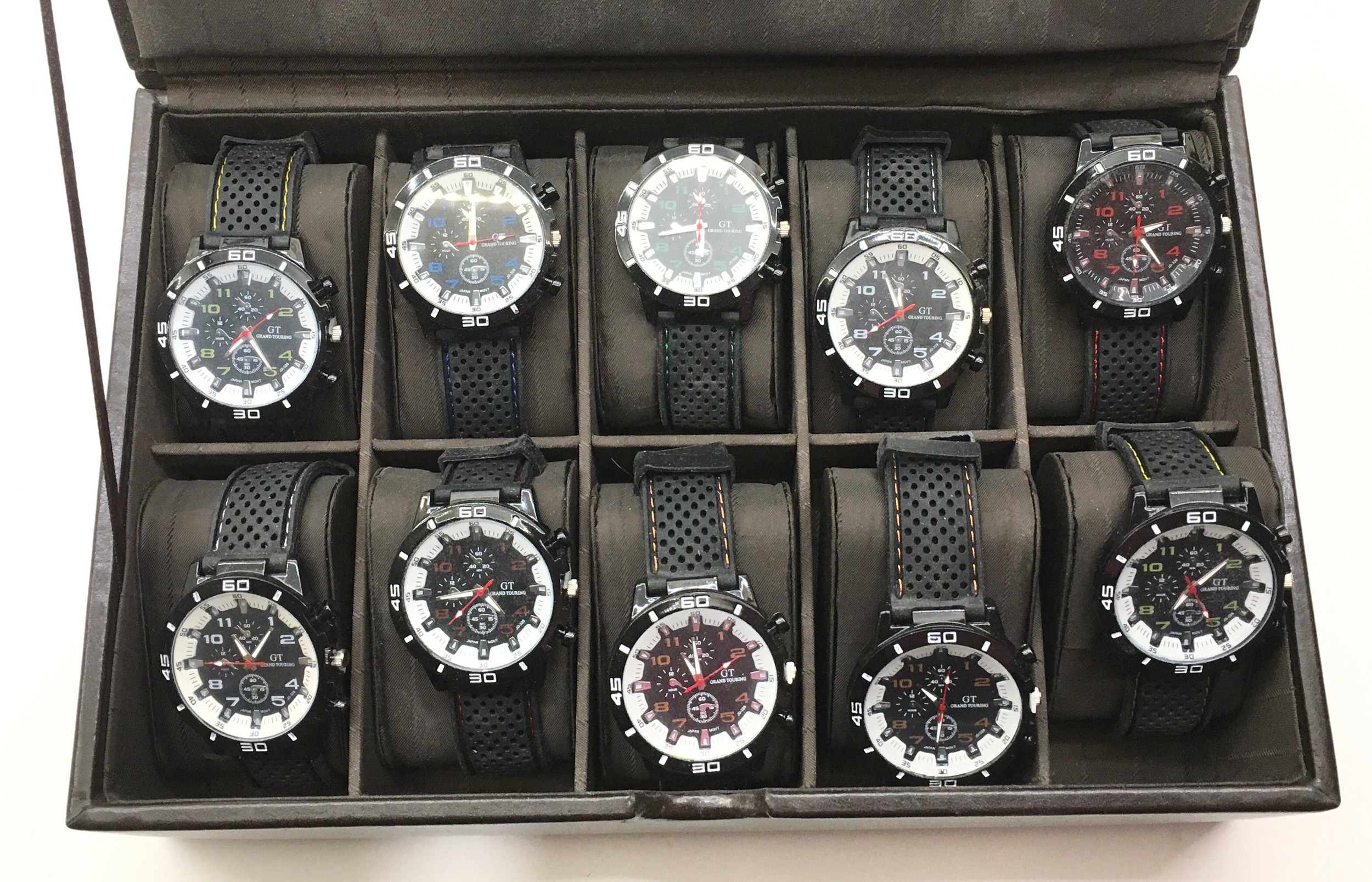 collection of 8 as new GT Grand Tourino gents quartz watches contained within a John Rocha watch