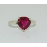 A 925 silver fully hallmarked ring with red stone to centre Size J 1/2.