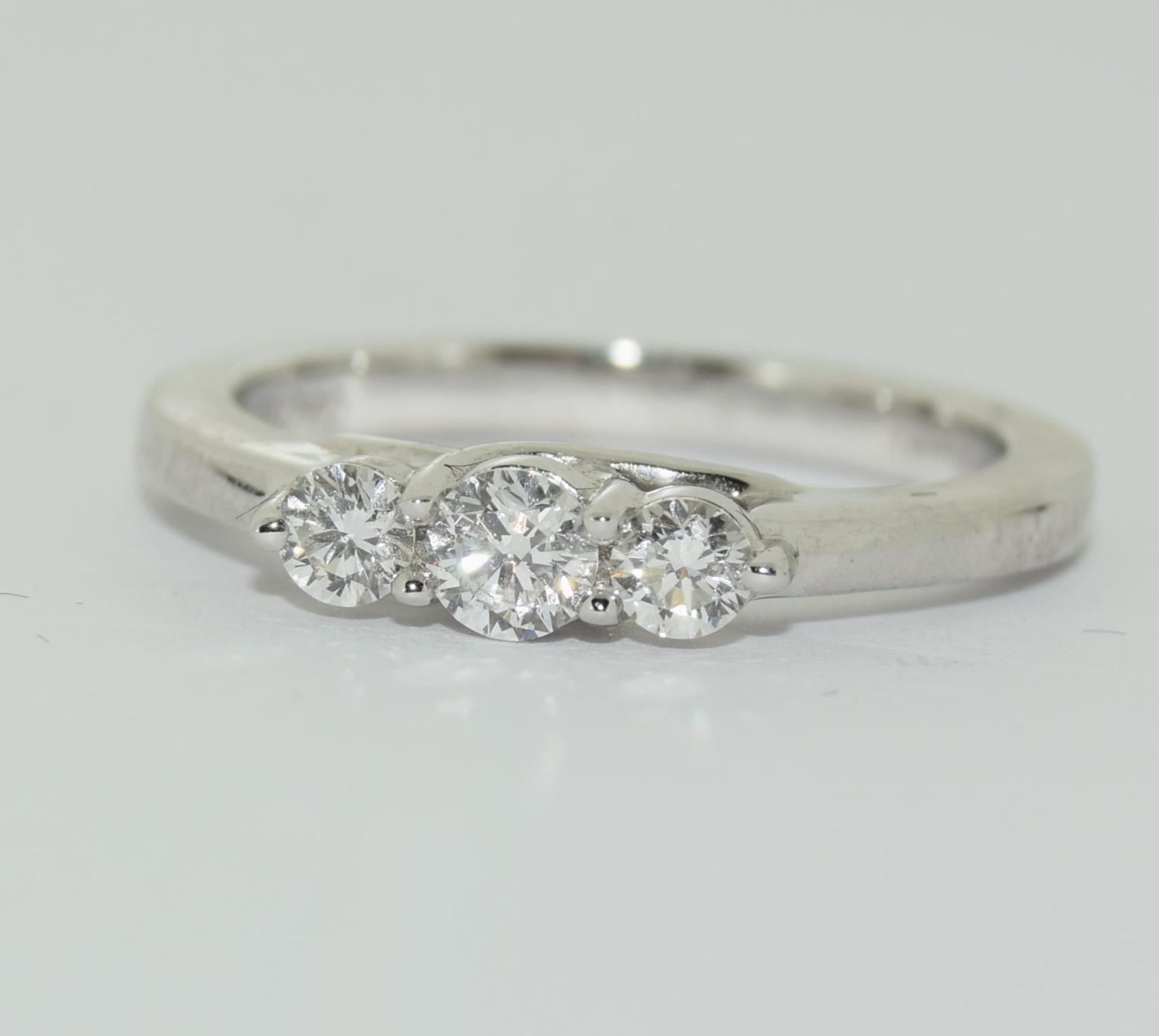 An 18ct white gold 3 graduated, claw set brilliant cut diamonds ring, total diamond weight 0.33ct. - Image 5 of 5