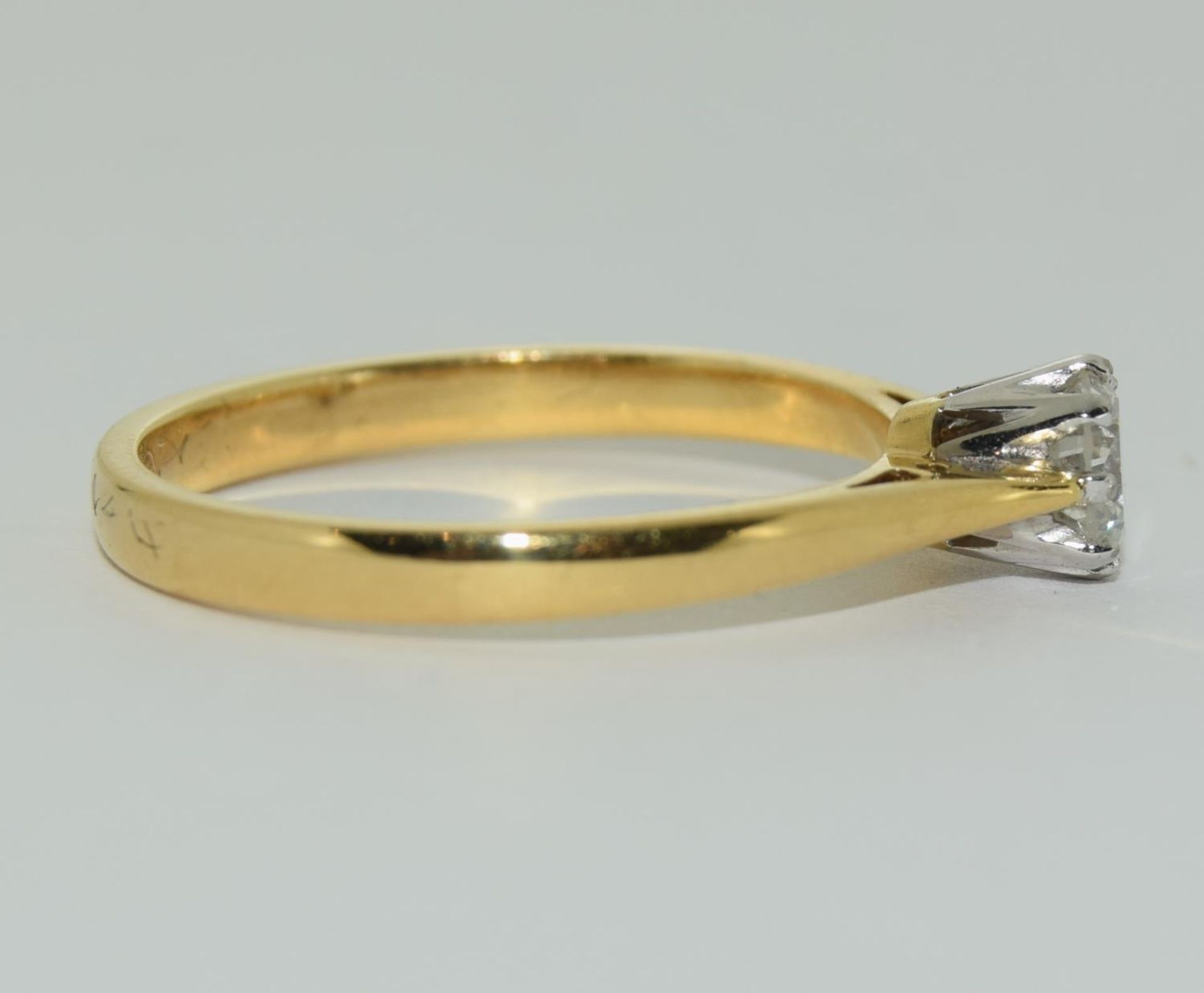 An 18ct yellow gold solitaire ring of 2.8gm of 0.39ct brilliant cut diamond size N. - Image 2 of 5