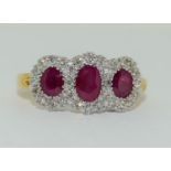 An 18ct yellow gold Diamond and ruby ring, approx weight 4.1gm approx diamond weight 0.25ct, diamond