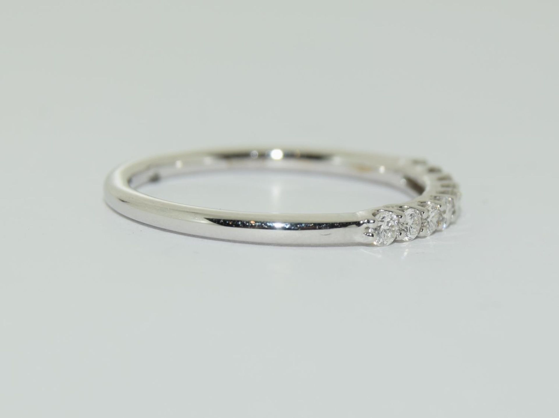 18ct white gold aura half eternity ring featuring nine uniform brilliant round cut diamonds each - Image 2 of 5