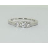 An 18ct white gold 3 graduated, claw set brilliant cut diamonds ring, total diamond weight 0.33ct.