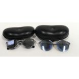 2 pairs of Moncler sunglasses in cases. Ref X385.