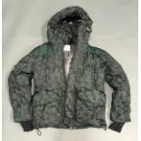 Moncler Camo coloured jacket. Size 3. Ref X516.