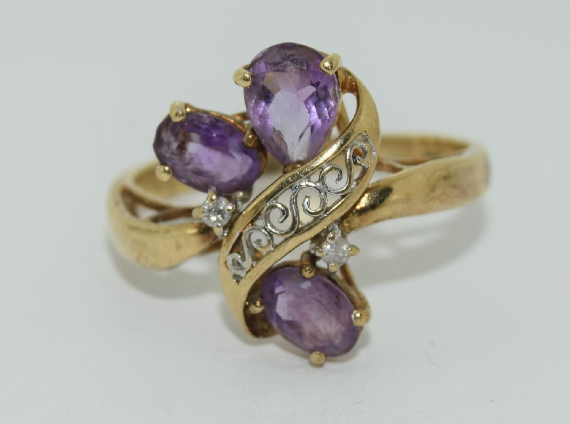 9ct gold ladies Amethyst and diamond sweep ring size R