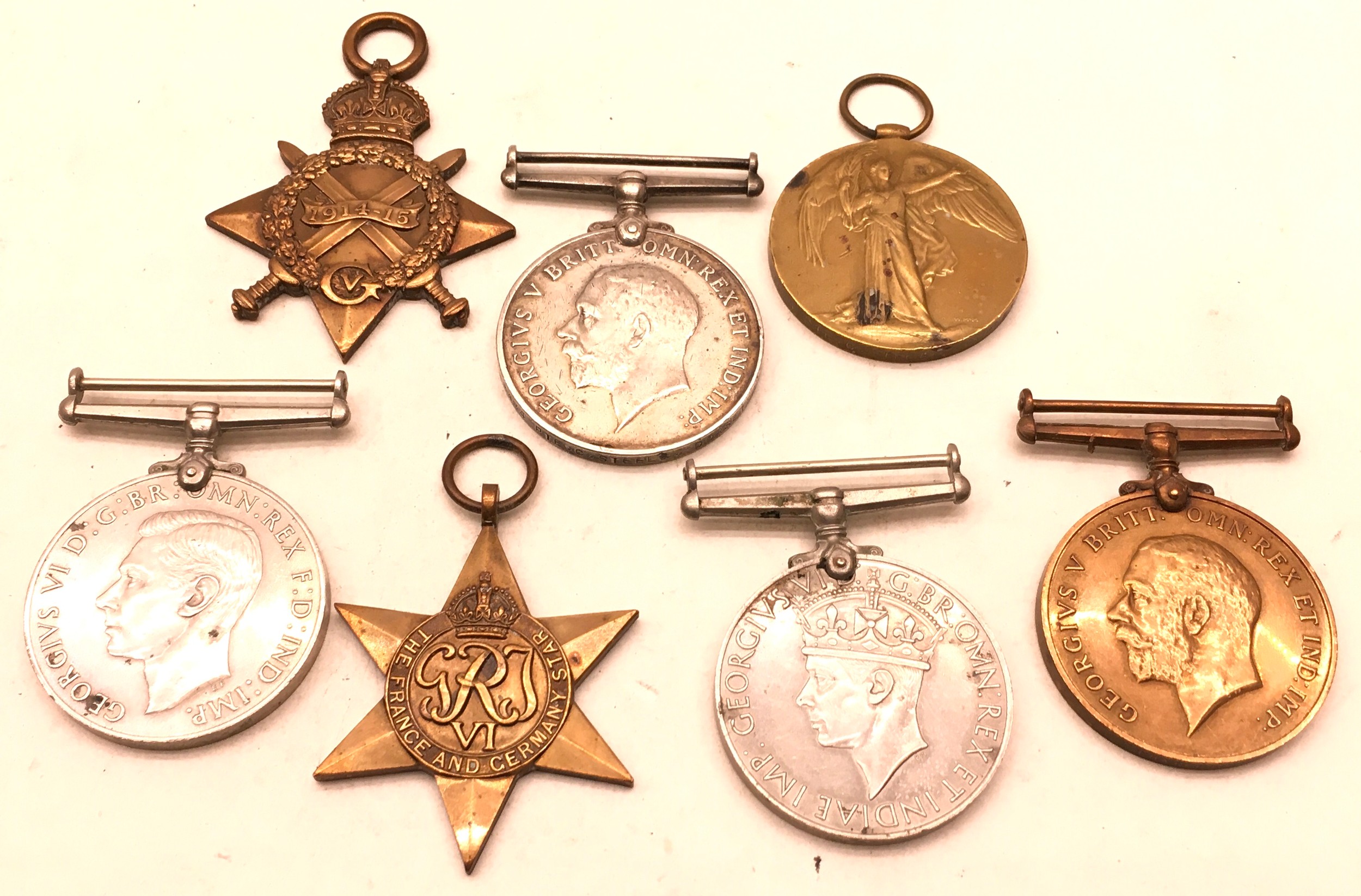 Collection of 7 medals to include WWi trio of 1914/15 star, War medal and Victory medal. Low