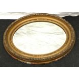 Vintage oval bevelled mirror 66x58cm.