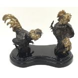 Pair of cold painted bronze fighting cocks on marble plinth signed ?Mene? 17x29x16cm.