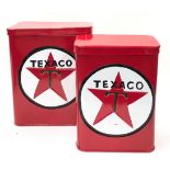 Two Texaco cans