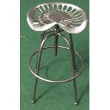 Tractor seat stool. (141)