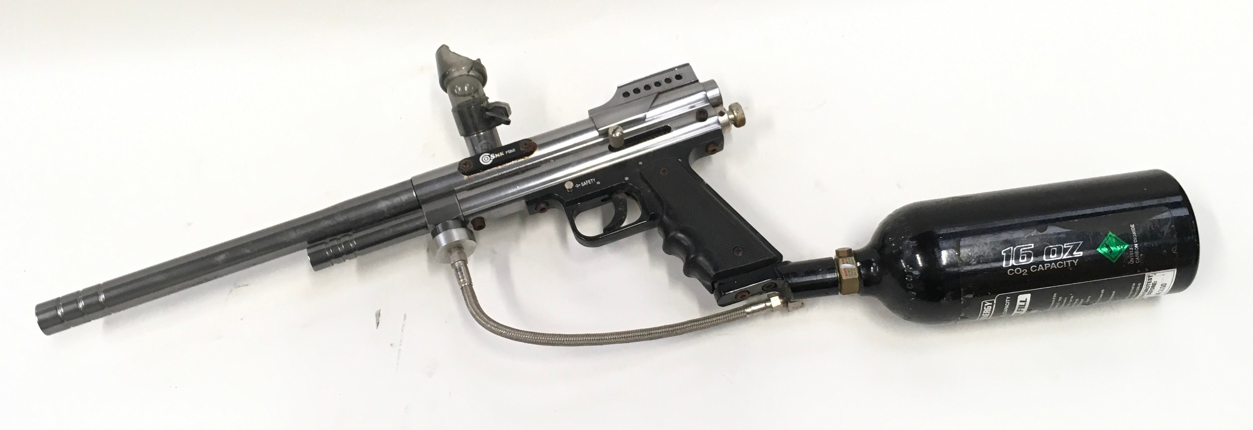 Paintball gun model SMK PBMI. with gas cartridge fitted. Appears to fire but ammo hopper missing.