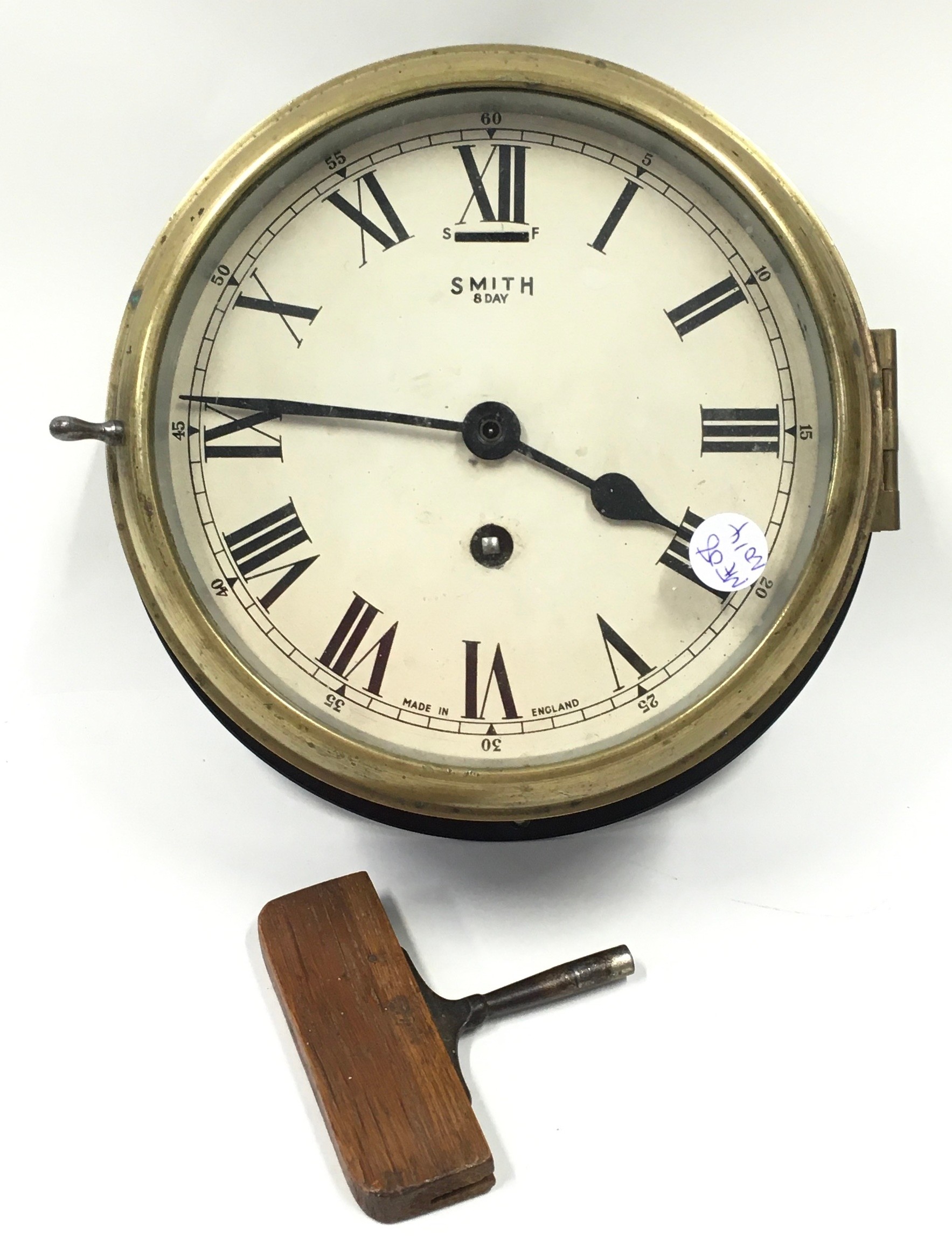 Royal Navy military marked Smith 8 day large deck clock working with key, face 19cm depth 12cm