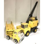 Pair of vintage Tonka toys. Large yellow pressed steel Car Carrier and large yellow crane with