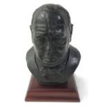 A limited edition ceramic bust of Winston Churchill no. 15 with certificate on wooden plinth. Signed