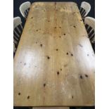 Planked Pine kitchen table on turned supports with set of 6 elm slat back country kitchen chairs,