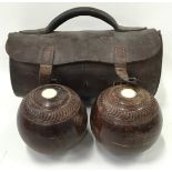Pair of vintage bowls in a leather carry case