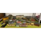 Large collection of model railway buildings.