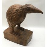 large solid wood carved figure of a kiwi 35cm across x 34cm tall