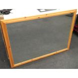 Large Ducal pine frame mirror with bevelled edge glass. Overall size 128cm x 93cm