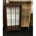 Contemporary pine glass display case/bookcase together with a smaller mahogany display case