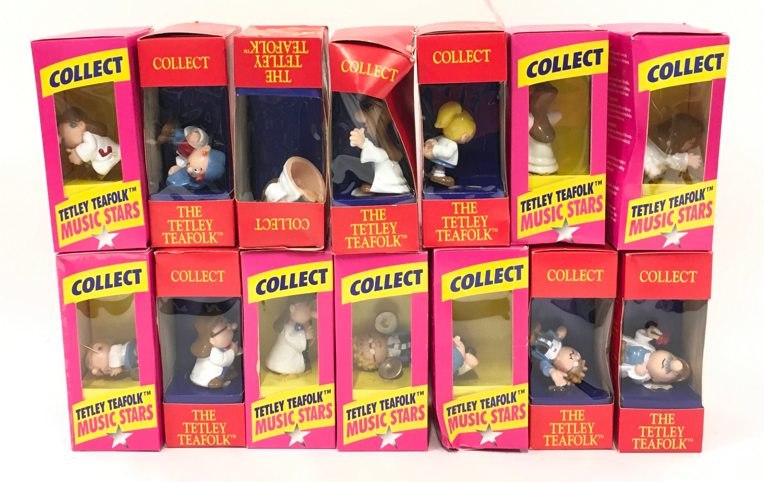 14 boxed Tetley Tea Folk figurines.