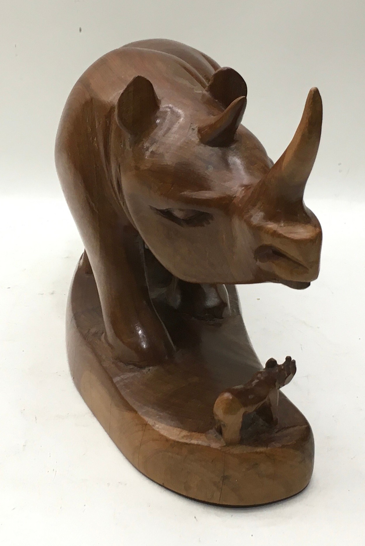 Large solid wood hand carved Rhinoceros and calf on plinth 29cm across x 20cm tall - Image 2 of 3