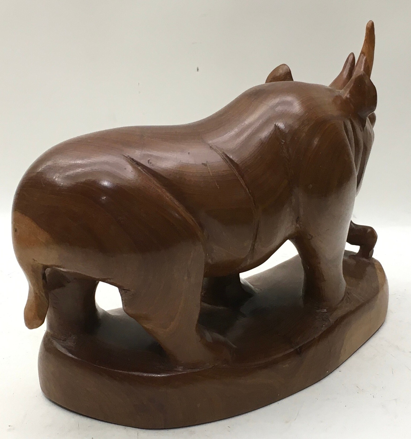 Large solid wood hand carved Rhinoceros and calf on plinth 29cm across x 20cm tall - Image 3 of 3