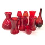 Collection of nine pieces of ruby red coloured glassware to include vases.
