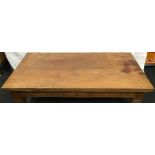 Solid oak coffee table on square legs 148x81x45cm.