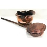 Copper helmet shape coal scuttle together a wooden handle copper bed warming pan