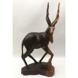 Large solid wood carved figure of an Eland with calf 24cm across x 48cm tall