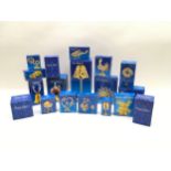 A large collection of boxed Crystal Temptations miniatures decorated with Swarovski components. 18
