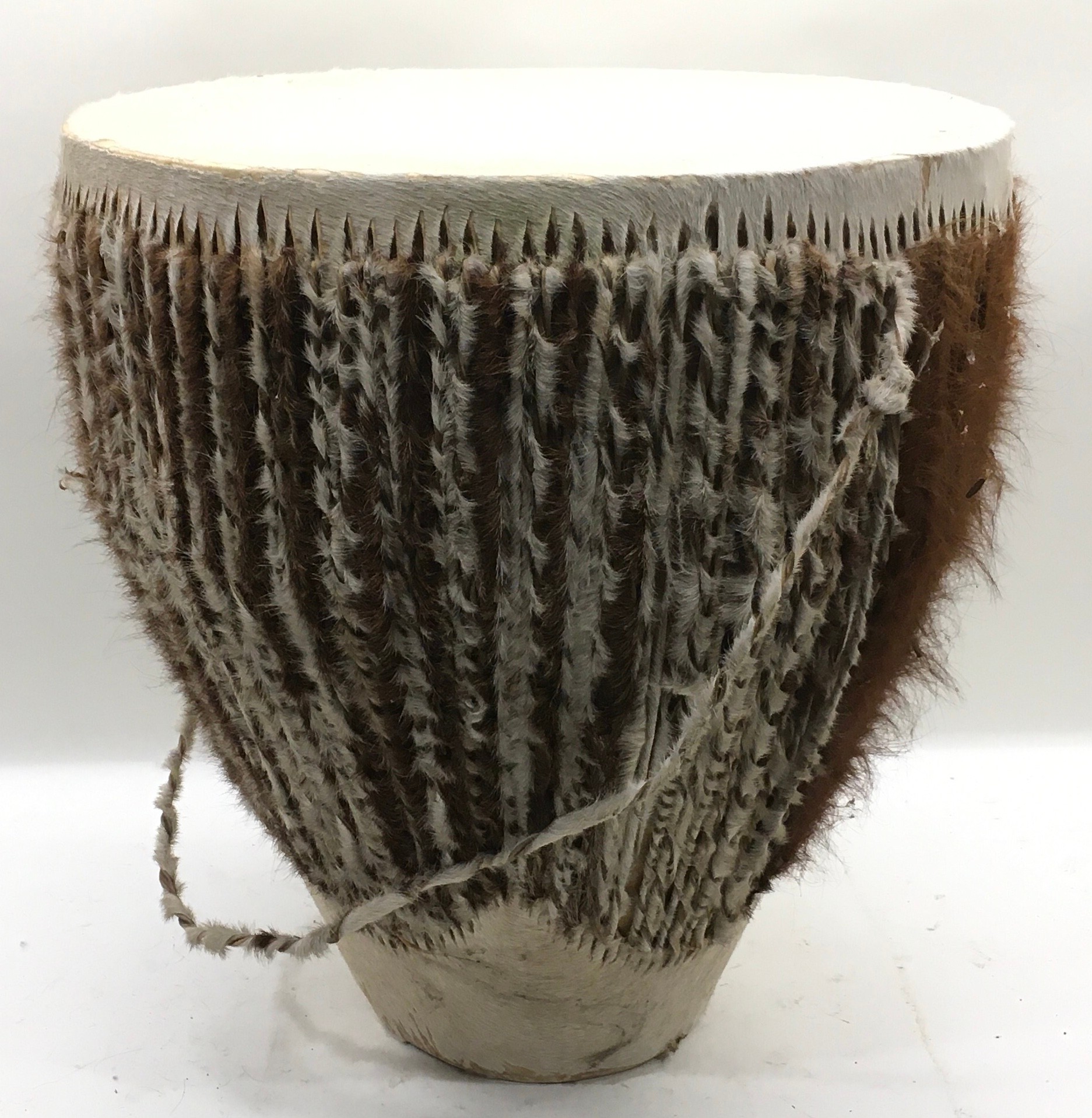 Large animal skin tribal drum. Approx 43cm tall