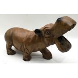 Large solid wood carved figure of a hippopotamus 39com x 25cm.