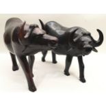 Very large pair of carved wood water buffalo the largest being 46cm across x 32cm tall