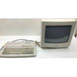 AMSTRAD PC. This is a AMSTRAD 464 plus pc along with a CM14 monitor.
