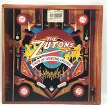 THE ZUTONS VINYL LP RECORD. ?Tired Of Hanging Around? on Deltasonic Records from 2006. In Ex